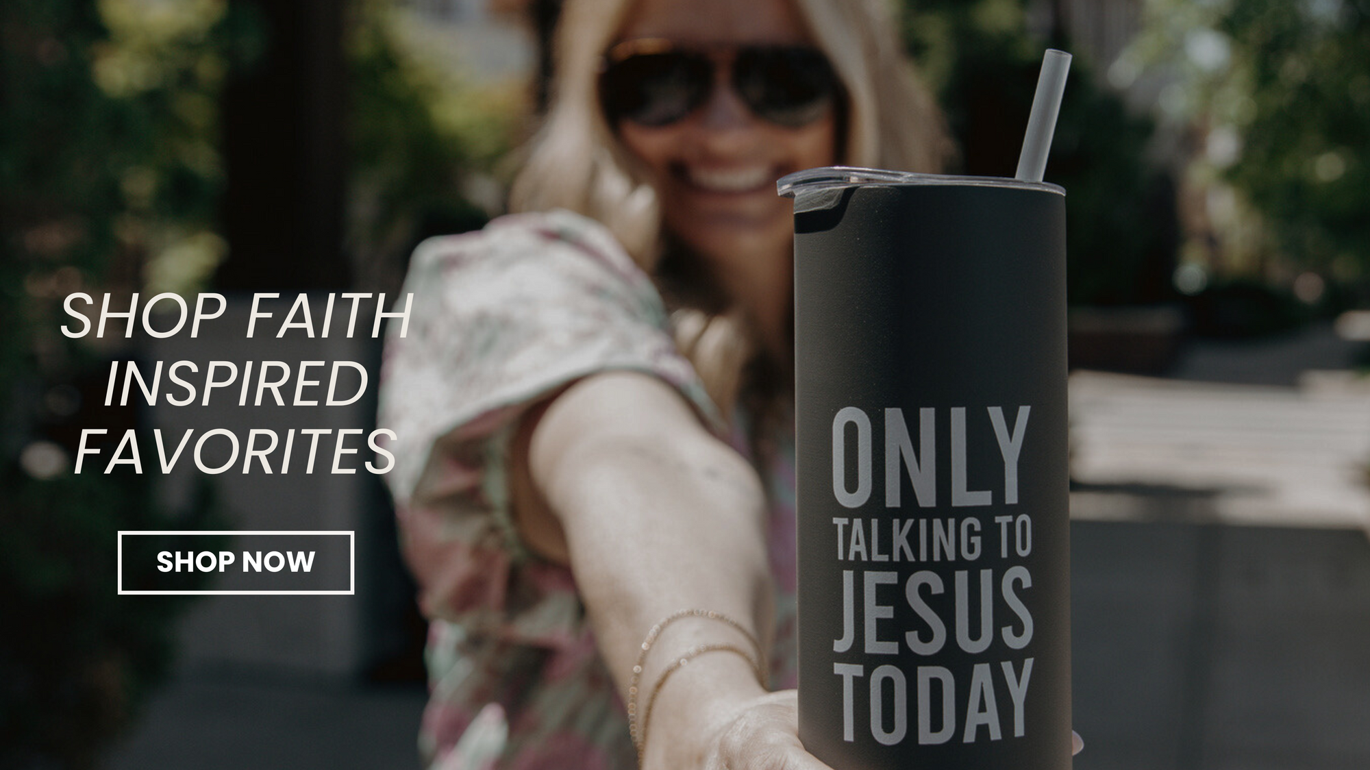 Person holding a black tumbler with 'Only Talking to Jesus Today' text, with promotional text for faith-inspired products.
